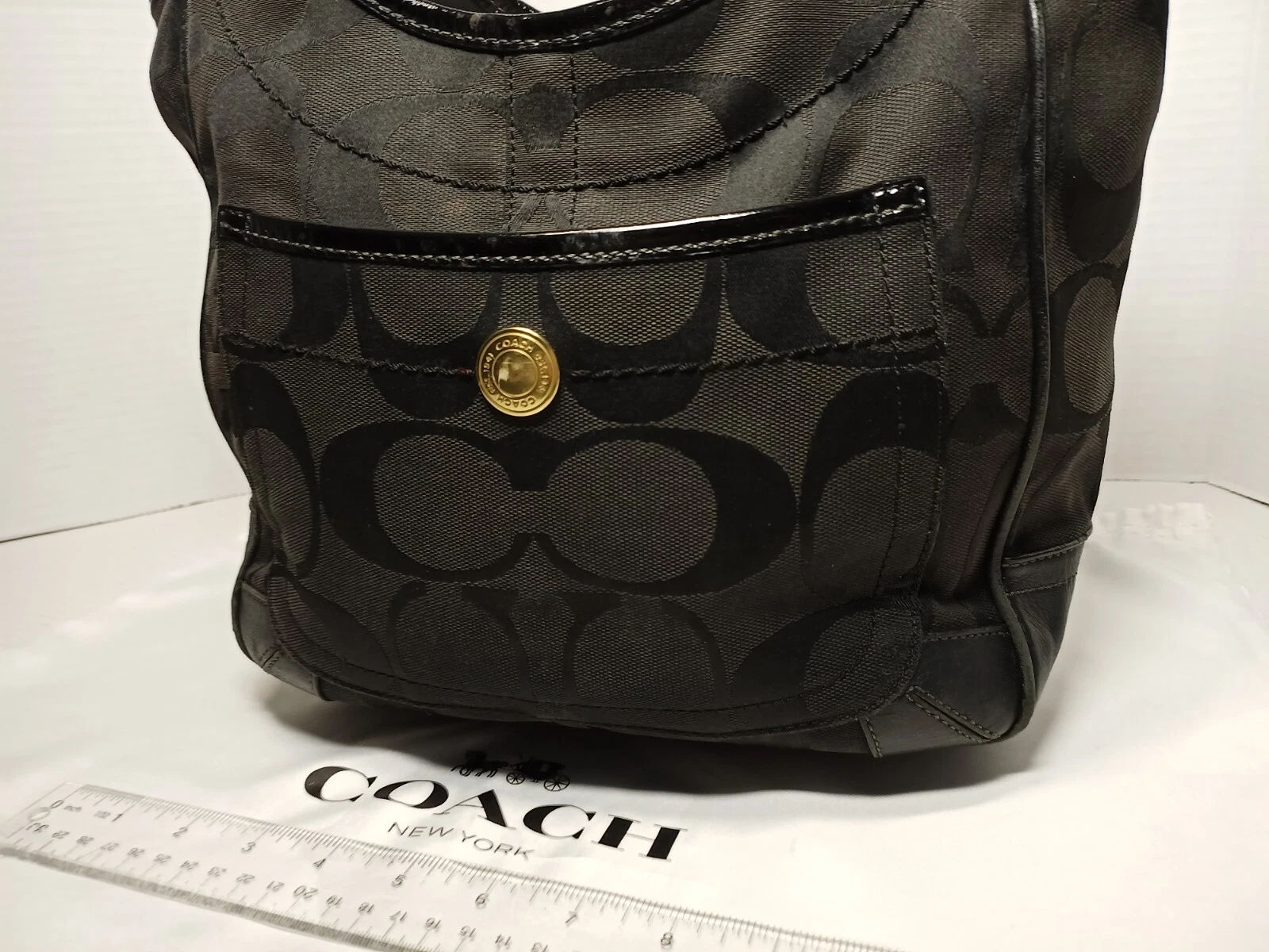 Borsa a tracolla Coach Legacy media nera firma op art tela pelle