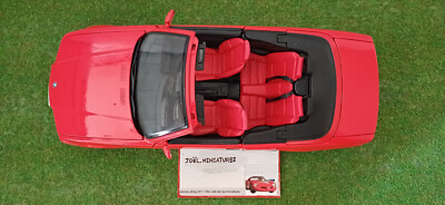 BMW 325i (E36 - 1990) Cabriolet ouvert rouge vin métallisé - SNC