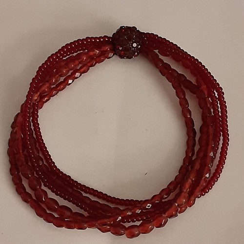 Multi-strand red beaded stretch bracelet