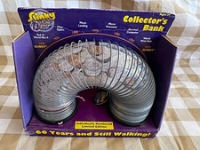 THE SLINKY: 1945~2005 60 YEAR COMMEMORATIVE COIN BANK LIMITED EDITION MIP 8767R