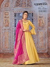 Yellow Haldi Function Wear Bridal Yellow Color Flared Gown With Pink Dupata Suit