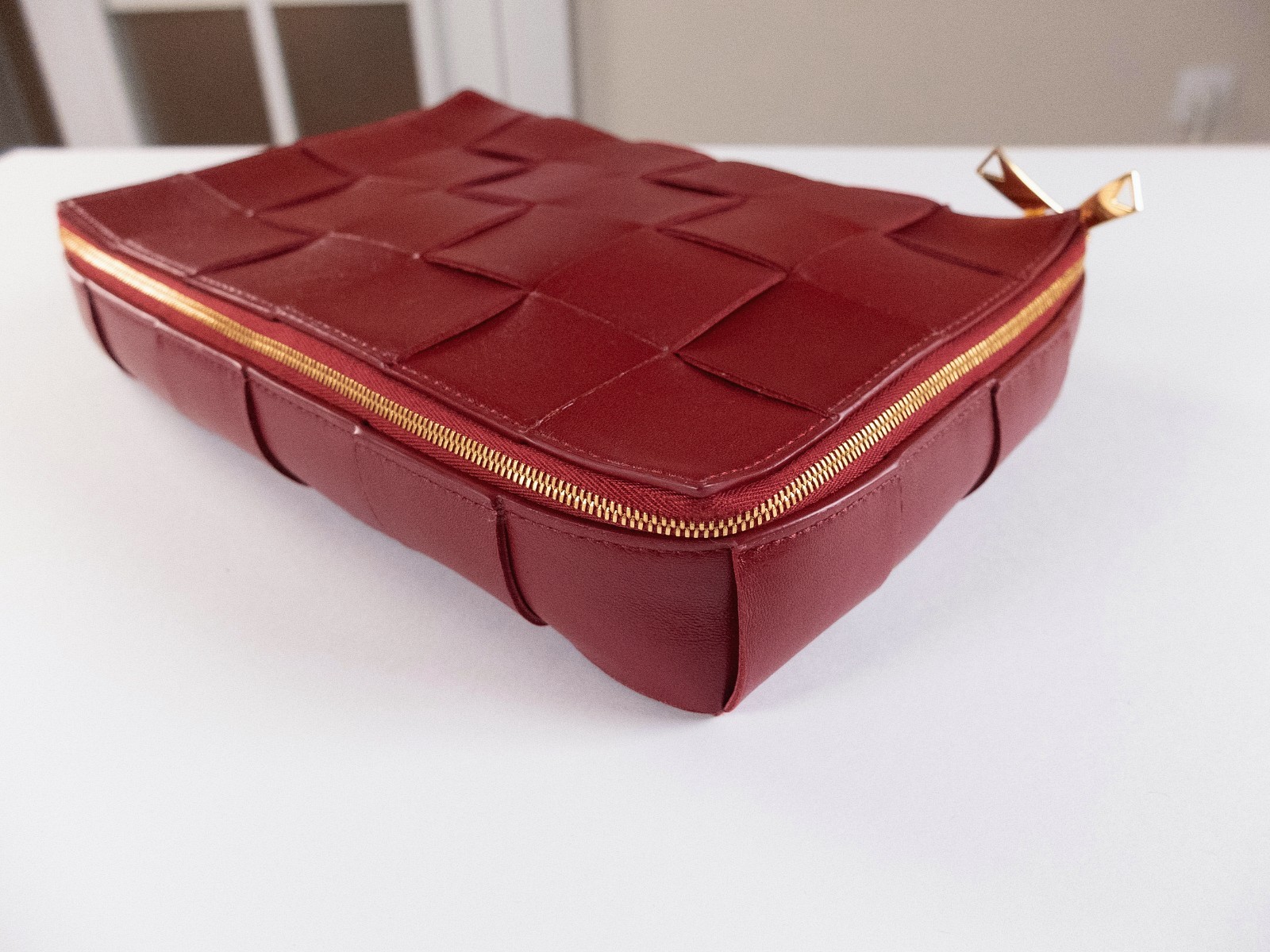 (NO CUSTOMS TAX) BOTTEGA VENETA red intrecciato leather organizer / clutch bag