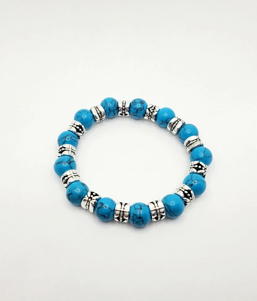 Pulsera elástica con cuentas turquesa sintética estilo tibetano hecha a mano Foto 4 de 4