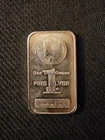 1 Troy Ounce .999 fine silver bar featuring a classic Morgan Dollar design.