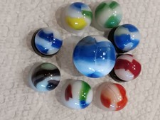 Marble King rainbow group of 9 marbles.You get these marbles. mint