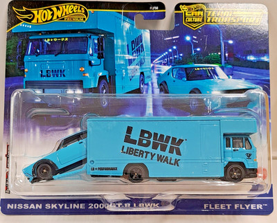 Hot Wheels FLF56-HRV45 Nissan Skyline 2000GT + Fleet Flyer- Team Transport #69
