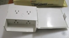 Woods Current Tap #7414 Has 4 Outlets,  Hinged Front Cover