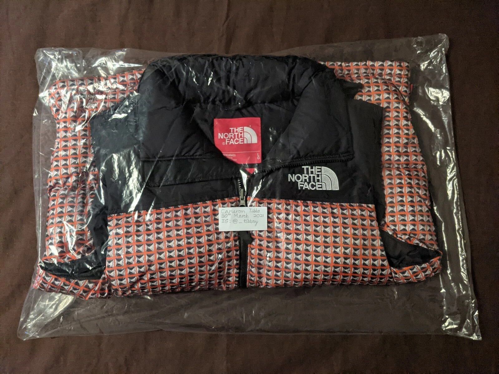 Gilet nuptse Supreme x The North Face (rouge/large) 