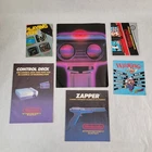 Nintendo Lot of Instruction Manual Booklets, NES Zapper, ROB Poster Ads Vintage