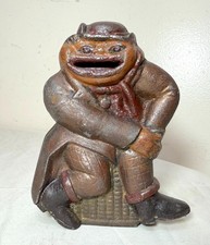 Exceedingly rare antique early 1900's cast iron figural man still coin bank