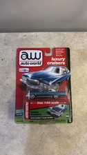 1976 Cadillac Coupe DeVille Auto World Luxury Cruisers Die-Cast Car 1:64