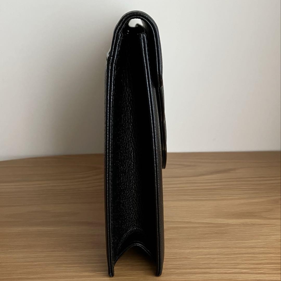 Borsa pochette Yves Saint Laurent YSL pelle nero oro autentica quasi mai usata