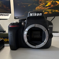 Nikon D3300 Digital SLR Camera Body Black 24.2MP Built-In Flash Strap