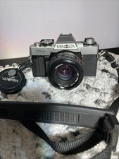 Minolta XG-1 35mm Camera. MD 50mm 1: 1.7 Lens.