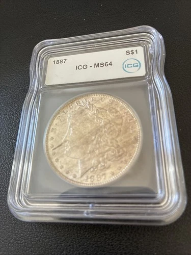 1887 Morgan Silver Dollar. ICG MS64. Valued At $150