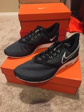 nike zoom strike all black
