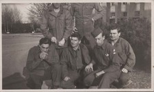 WW2 Photo of Group of Soldiers Kneeling on Paved Road