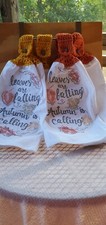 Set of 2 hanging kitchen towels with embroidered motif and handmade crochet tops