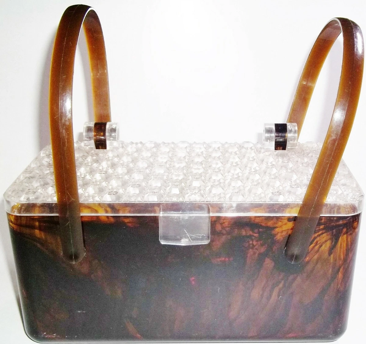 Sold at auction Rialto Jeweled Lucite Purse, Feiner Bags Lucite Purse and a  Butterscotch Lucite Purse. Auction Number 2227 Lot Number 195 | Skinner  Auctioneers