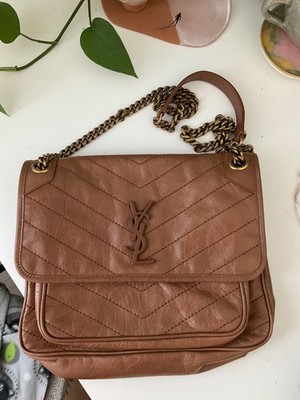 Beautiful Yves Saint Laurent brown leather shoulder bag featuring the iconic YSL