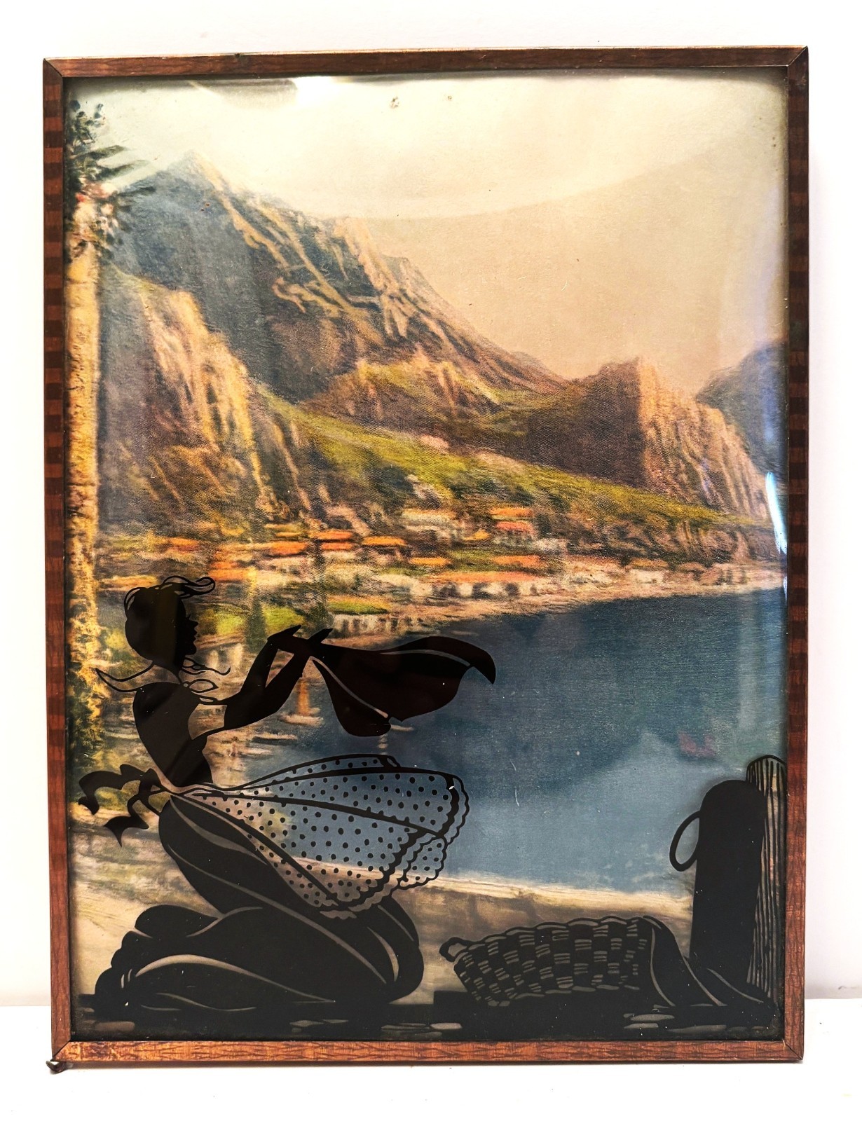 1930’s Reverse Painted Silhouette on Convex Glass Woman Doing Laundry by Lake