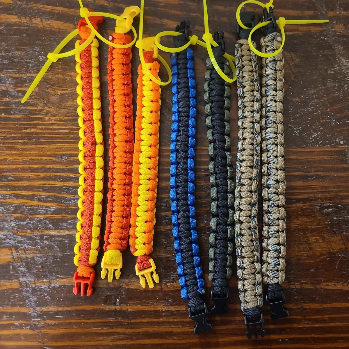 Paracord bracelets custom made and handmade by my 13 year old daughter