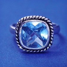 Size 7.75, vintage sterling 925 silver handmade ring with blue topaz and cable