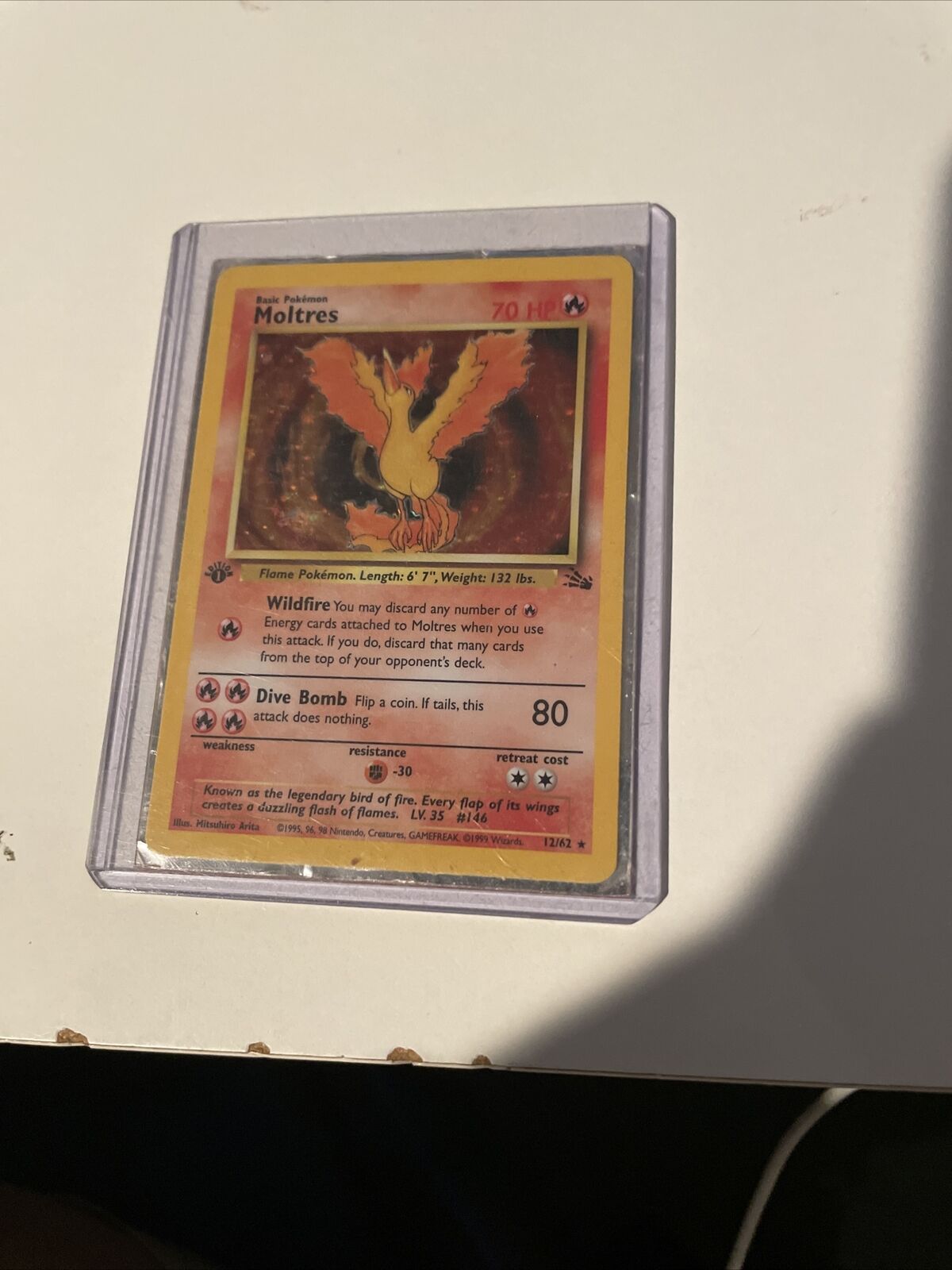 Check the actual price of your Moltres 12/62 Pokemon card