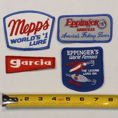 4 Vintage Fishing Lure Patch Lot Mepps Garcia Eppinger Dardevle