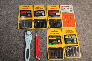 Lot - 6 Packs Of Singer Sewing Needles, Westcott Fabric Cutter, Seam Ripper