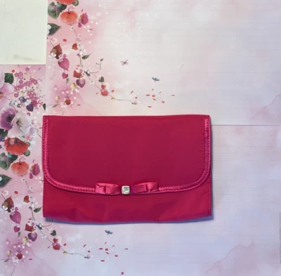 Lancôme – Mignonne pochette rose - Photo 1/4