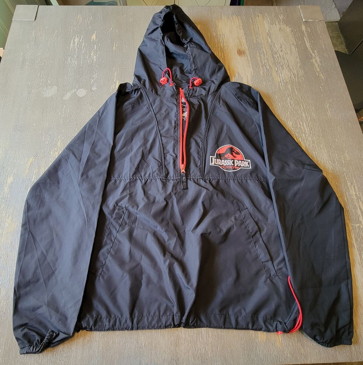 Universal Studios Jurassic Park Adult Hooded Windbreaker Universal Studios Jurassic Park Adult Hooded Windbreaker