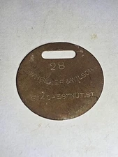 1800s Wheeler & Wilson Luggage Tag?