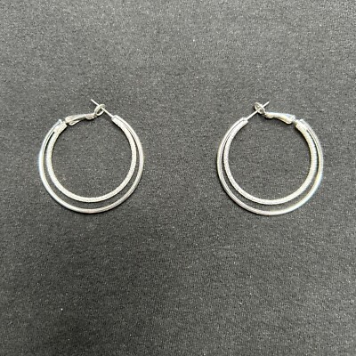 Avon Rising star hoop earrings Signature Collection Silvertone