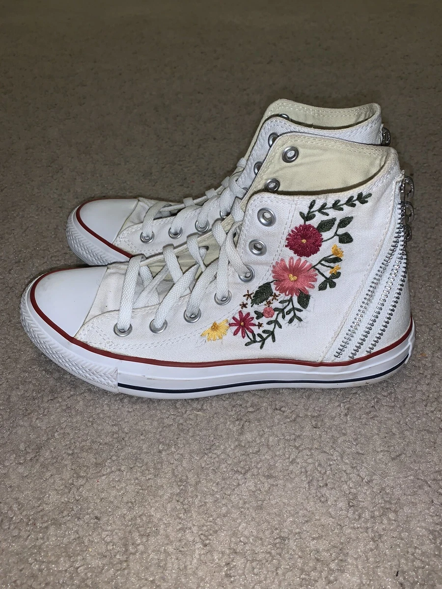 White converse shop with flowers