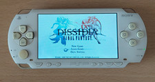Sony PSP-1003 White PAL Handheld Console + UK Charger 32MB Stick + Game
