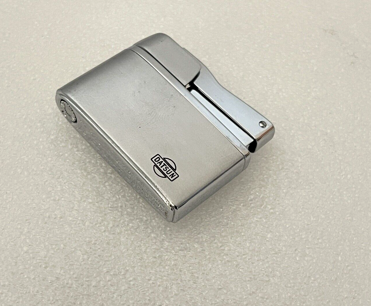 VINTAGE PRINCE GAS CORONET POCKET LIGHTER ADVERTISING DATSUN VINTAGE PRINCE GAS CORONET POCKET LIGHTER ADVERTISING DATSUN