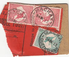 Postmark MACKAY Queensland on 1/- emerald 1st watermark & pair 1d Kangaroo stamp