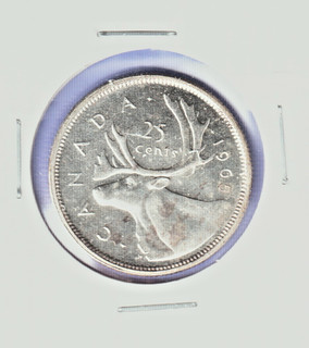 A Canada uncirculated silver 25 Cent quarter 1965.