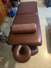 Folding massage table