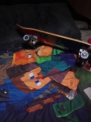 This Is A Skateboard And  It's Still Got Plastic On It