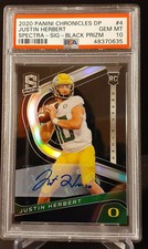 2020 JUSTIN HERBERT CHRONICLES SPECTRA BLACK PRIZM AUTO 1/7