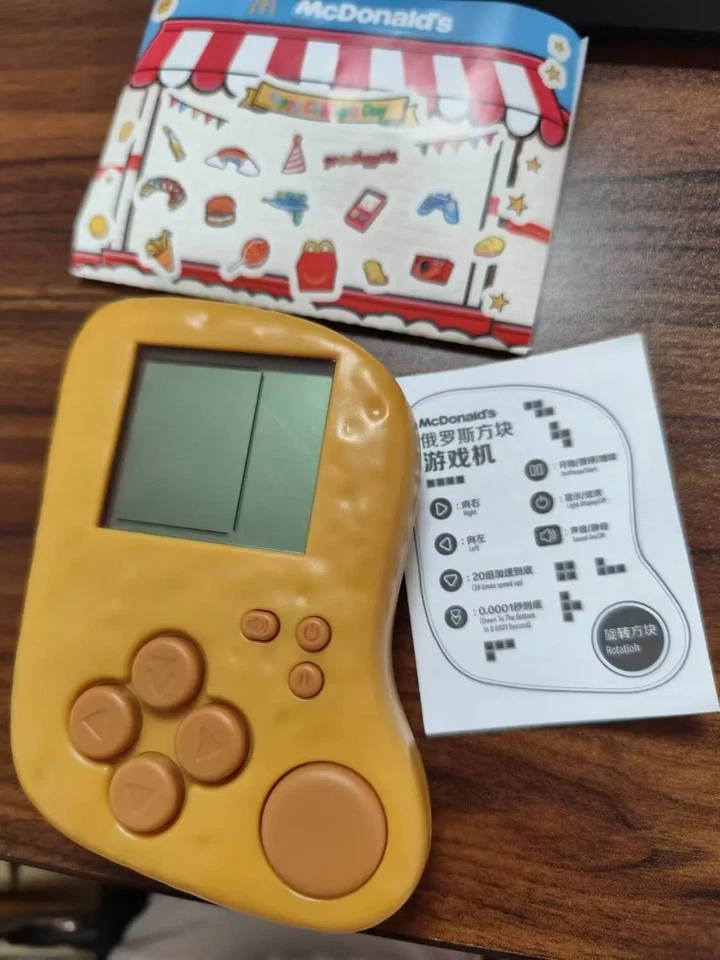 Máquina de juego McDonald's en forma de pepita de pollo con dos pilas Regalo para pareja Foto 3 de 4