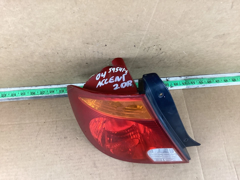 2003-2006 Hyundai Accent 2 Door Left Side Tail Light Assembly - Image 2 of 4