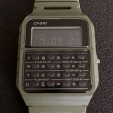 80s design CASIO Data Bank Calculator, khaki, battery replaced.