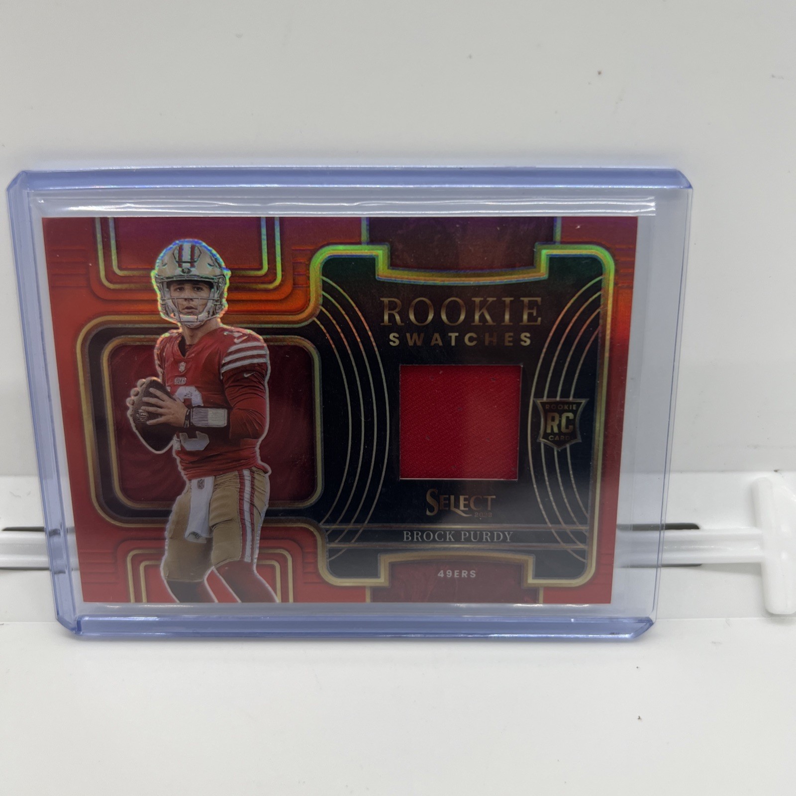 2022 Select Brock Purdy #RSW-17 Rookie Swatches Red Prizm Jersey Relic