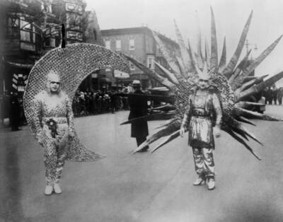 People wearing Silver Moon and Golden Sun costumes during the carn - Old Photo