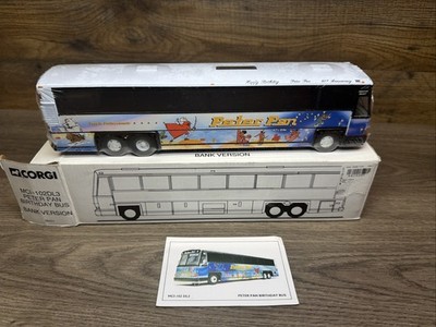 Corgi MCI-102 DL3 Peter Pan Birthday Bus 1:50 Scale DieCast NIB