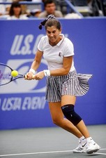 Tennis player Monica Seles of Yugoslavia hits a return at the wome- Old Photo 4