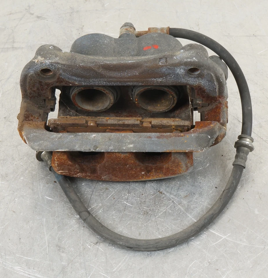 Pinza de freno delantera derecha Nissan Quest 2011-2017 OEM Foto 4 de 4